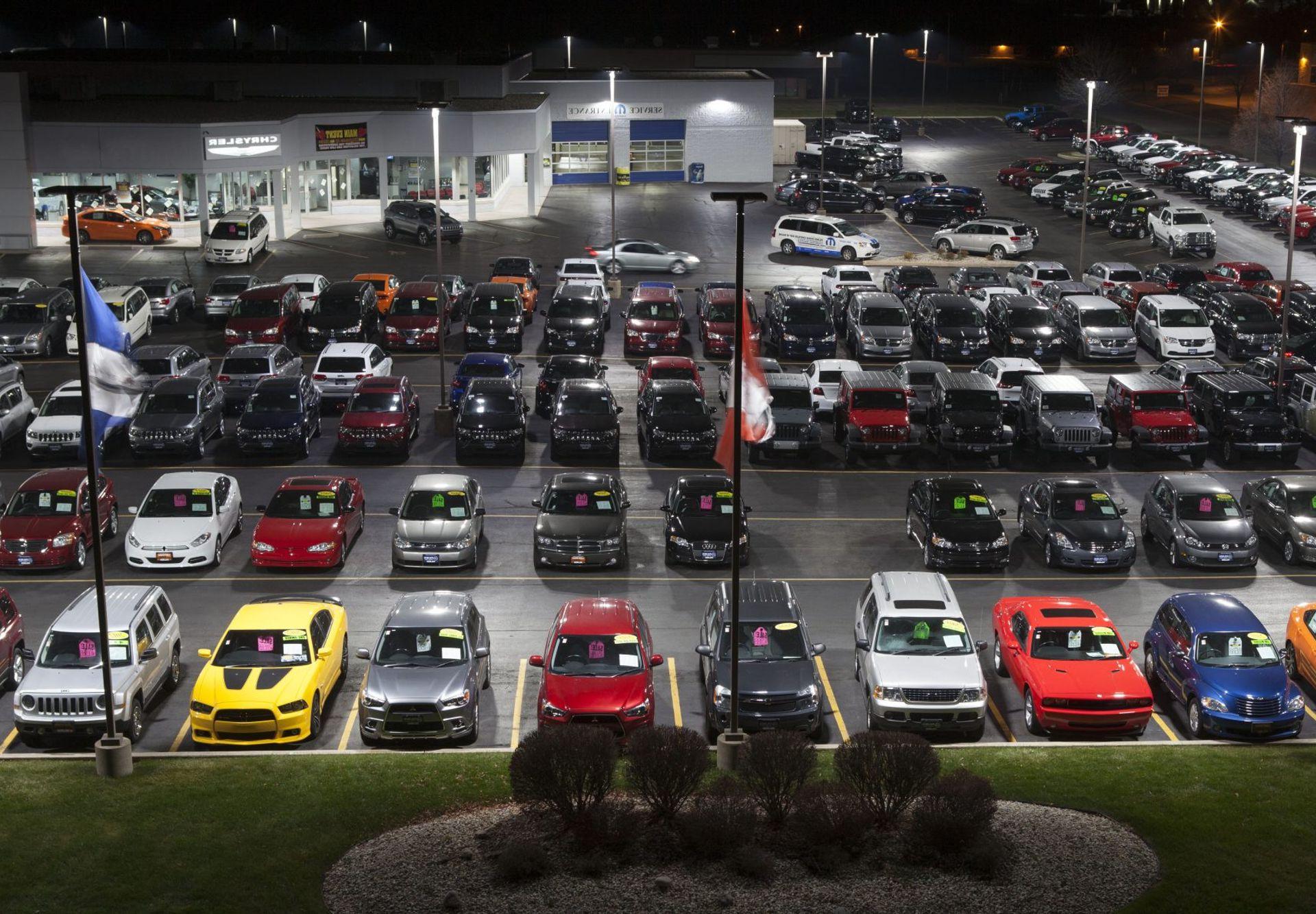 aerial view of cars at a dealership